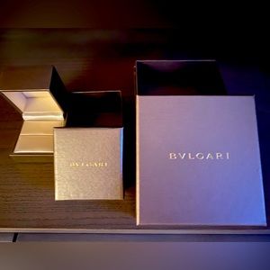 Bulgari packaging - perfect condition.  Cushioned ring box + 2 larger boxes.